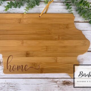Custom engraved "home" serving board - $35.00 - local pickup or shipping available.

Our Iowa state series bamboo cutting and serving boards are a real novelty. A perfect gift for anyone who loves their great homeland. Great gift for an engagement, wedding, new home etc.

Made from 100% rapidly renewable bamboo, our boards are ultra-light and super-strong. Ideal for both indoor and outdoor entertaining, they can be used as a cutting or bar board, cheese tray, serving platter or simply as a conversation piece. The board can be hung on the wall by its rustic tie-string hanging loop. 
*Engraved board should not be used for cutting, display only. Green bowl not included.

The Iowa board is approximately 14.5 x 10.25 x 0.5" Limited quantities available.

To clean, wash by hand with warm soapy water (do not put in dishwasher)

#personalizedgifts #giftideas #handmade #personalized #realtorgifts #custommade  #smallbusiness #giftsforher #custom #love #customizedgifts #customized #giftsforhim #shoplocal #supportsmallbusiness #customgifts #birthday #shopsmall #personalisedgifts #homedecor #handmadegifts #giftshop #personalised #iowa #hawkeyes #iowastateuniversity #iowa #iowahawkeyes #charcuterieboard #charcuterie #wine